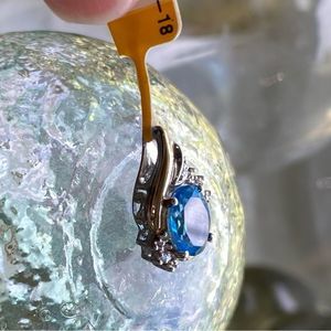 Authentic blue topaz with accent Diamond pendant. NWT 925 w/10k gold accent
